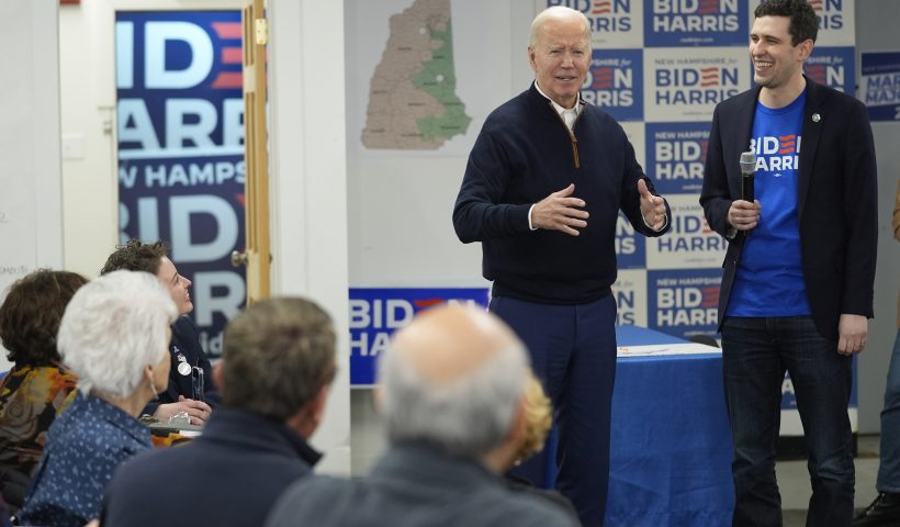 President Joe Biden, second right, greets supporters during a visit to a campaign field office, Monday, March 11, 2024, in Manchester, N.H. (AP Photo/Evan Vucci)