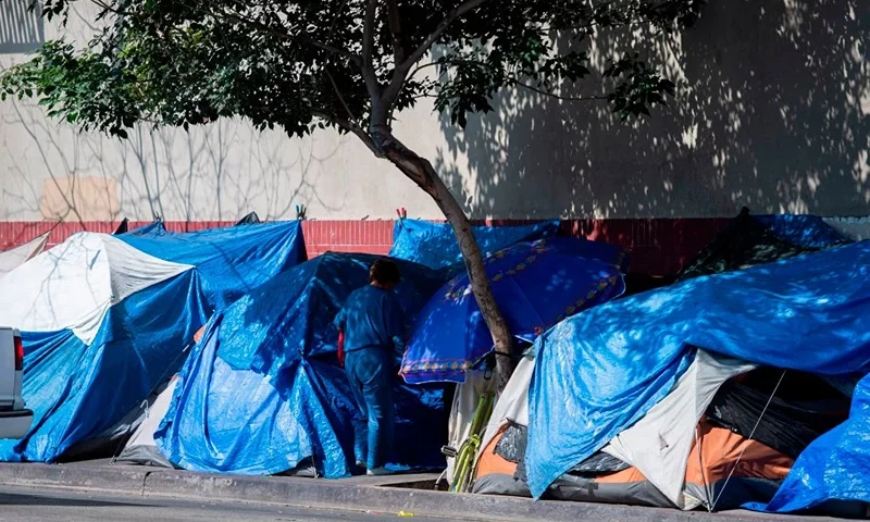 Tents line the street in Skid Row in Los Angeles, California on September 17, 2019. - US President Donald Trump has indicated he plans to address the homeless crisis in California as he lands later today in Los Angeles for a two-day visit with stops for fundraising in Palo Alto, Beverly Hills and San Diego. (Photo by Robyn Beck / AFP) (Photo credit should read ROBYN BECK/AFP via Getty Images)