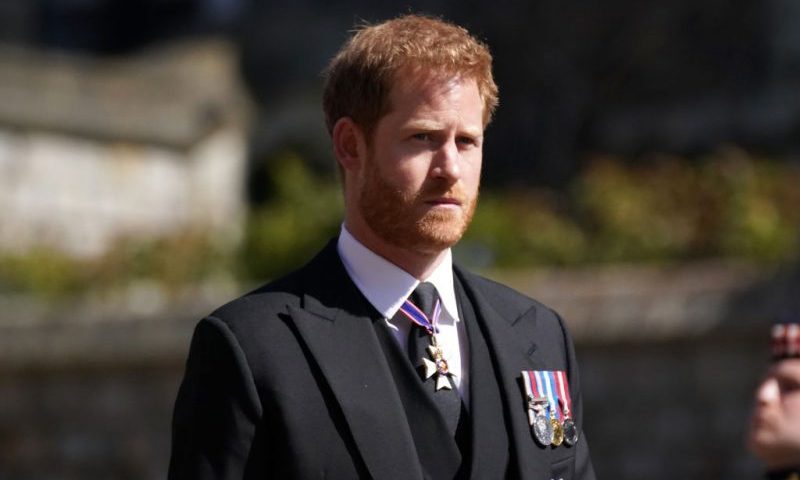 WINDSOR, ENGLAND - APRIL 17: Prince Harry arrives for the funeral of Prince Philip, Duke of Edinburgh at St George's Chapel at Windsor Castle on April 17, 2021 in Windsor, England. Prince Philip of Greece and Denmark was born 10 June 1921, in Greece. He served in the British Royal Navy and fought in WWII. He married the then Princess Elizabeth on 20 November 1947 and was created Duke of Edinburgh, Earl of Merioneth, and Baron Greenwich by King VI. He served as Prince Consort to Queen Elizabeth II until his death on April 9 2021, months short of his 100th birthday. His funeral takes place today at Windsor Castle with only 30 guests invited due to Coronavirus pandemic restrictions. (Photo by Victoria Jones - WPA Pool/Getty Images)