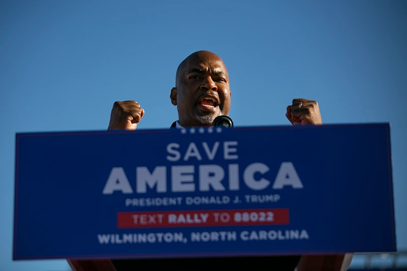 Donald Trump Holds Rally For North Carolina Midterm Candidates
WILMINGTON, NC - SEPTEMBER 23: Mark Robinson, lieutenant governor of North Carolina, is seen during a Save America rally for former President Donald Trump at the Aero Center Wilmington on September 23, 2022 in Wilmington, North Carolina. The "Save America" rally was a continuation of Donald Trump's effort to advance the Republican agenda by energizing voters and highlighting candidates and causes. (Photo by Allison Joyce/Getty Images)