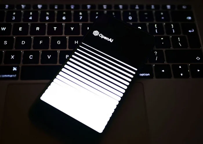 A photo taken on March 31, 2023 in Manta, near Turin, shows a smartphone displaying the logo of the artificial intelligence OpenAI research laboratory. Italy's privacy watchdog said on March it had blocked the controversial robot ChatGPT, saying the artificial intelligence app did not respect user data and could not verify users' age. (Photo by Marco BERTORELLO / AFP) (Photo by MARCO BERTORELLO/AFP via Getty Images)