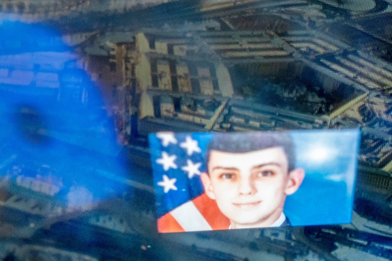 TOPSHOT - This photo illustration created on April 13, 2023, shows the Discord logo and the suspect, national guardsman Jack Teixeira, reflected in an image of the Pentagon in Washington, DC. - FBI agents on Thursday arrested a young national guardsman suspected of being behind a major leak of sensitive US government secrets -- including about the Ukraine war. US Attorney General Merrick Garland announced the arrest made 