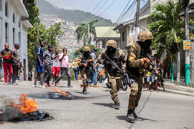 Hundreds Of Inmates Escape After Armed Gangs Storm Haiti's Main Prison