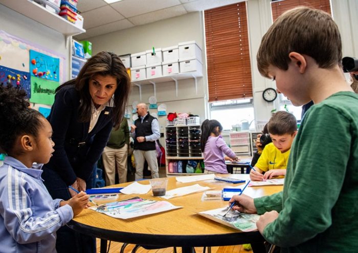 Former UN ambassador and 2024 presidential hopeful Nikki Haley speaks with children in a kindergarten/first grade classroom at the Polaris Charter School in Manchester, New Hampshire, on January 19, 2024. The state's primary is scheduled for January 23, 2024. (Photo by Joseph Prezioso / AFP) (Photo by JOSEPH PREZIOSO/AFP via Getty Images)