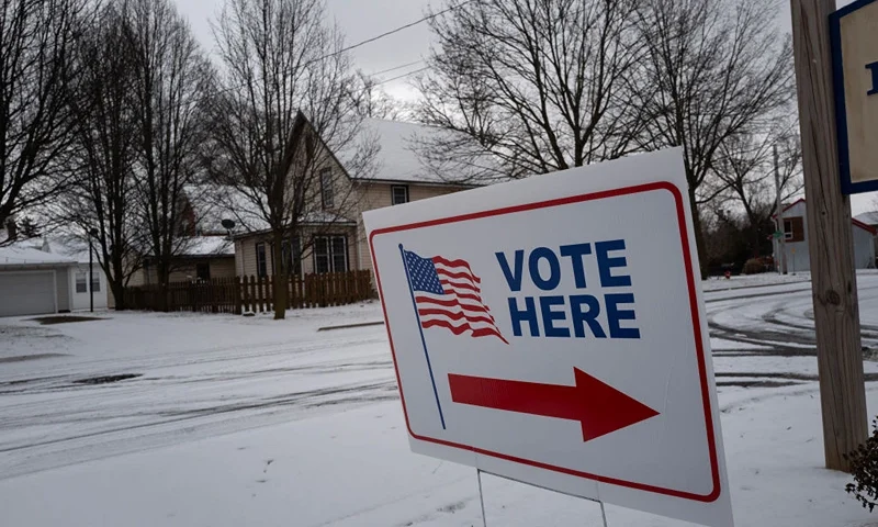 BATTLE CREEK, MICHIGAN - FEBRUARY 17: A sign directs voter to an early voting site on February 17, 2024 in Battle Creek, Michigan. In-person early voting was made available to Michigan resident for the first time today. Early voting sites in the state will remain open at least 8 hours each day for the next nine days. (Photo by Scott Olson/Getty Images)