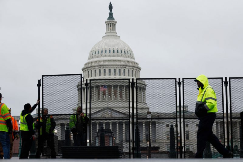 WASHINGTON, DC - MARCH 06: Eight-feet-tall steel fencing is put up around the U.S. Capitol the day before President Joe Biden is to deliver the State of the Union address on March 06, 2024 in Washington, DC. The security fence has been erected during each of the president's annual addresses since the attacks of January 06, 2021. (Photo by Chip Somodevilla/Getty Images)