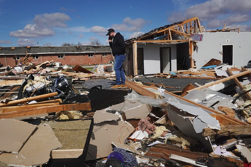 Tornadoes Rip Through Midwest, Leaving Damage And Deaths In Ohio And Indiana
WINCHESTER, INDIANA - MARCH 15: Pastor Matthew Holloway surveys damage to his church after the structure was leveled by a tornado on March 15, 2024 in Winchester, Indiana. At least three people have been reported dead after a series of tornadoes ripped through the Midwest yesterday. (Photo by Scott Olson/Getty Images)
