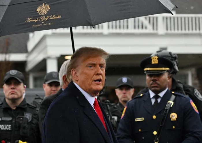 Former US President Donald Trump speaks to the press after attending the wake for New York Police Department (NYPD) Officer Jonathan Diller in Massapequa, Long Island, New York, on March 28, 2024. Diller was part of the NYPD's Critical Response Team when he was gunned down during a traffic stop in Queens on the night of March 25. (Photo by ANGELA WEISS / AFP) (Photo by ANGELA WEISS/AFP via Getty Images)