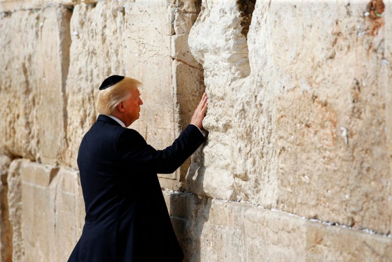 US President Donald Trump visits the Western Wall, the holiest site where Jews can pray, in Jerusalem's Old City on May 22, 2017. (Photo by RONEN ZVULUN / POOL / AFP) (Photo by RONEN ZVULUN/POOL/AFP via Getty Images)