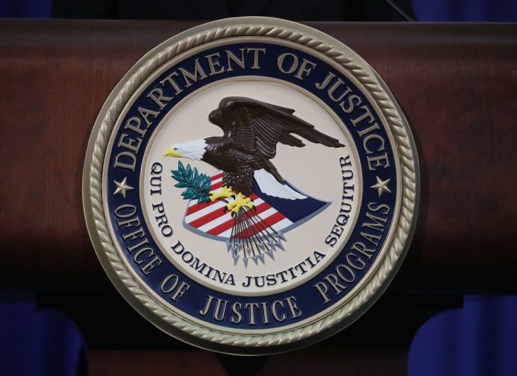 WASHINGTON, DC - JUNE 29: The Justice Department seal is seen on the lectern during a Hate Crimes Subcommittee summit on June 29, 2017 in Washington, DC. The meeting gave stakeholders the opportunity to offer imput to the committee before it makes its recommendations to the attorney general on what the Department of Justice can do to improve reporting, investigation and prosecution of hate crimes. (Photo by Mark Wilson/Getty Images)