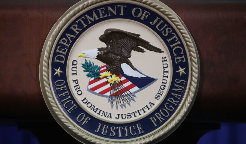 WASHINGTON, DC - JUNE 29: The Justice Department seal is seen on the lectern during a Hate Crimes Subcommittee summit on June 29, 2017 in Washington, DC. The meeting gave stakeholders the opportunity to offer imput to the committee before it makes its recommendations to the attorney general on what the Department of Justice can do to improve reporting, investigation and prosecution of hate crimes. (Photo by Mark Wilson/Getty Images)