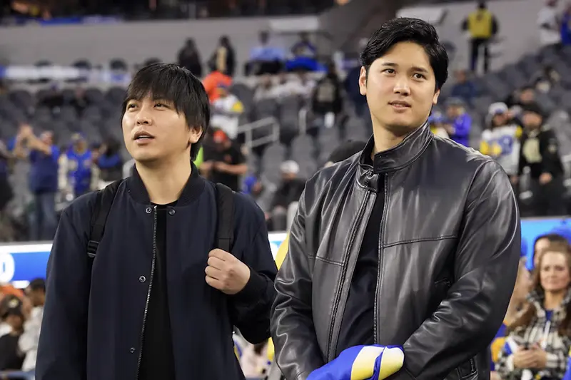 Los Angeles Dodgers player Shohei Ohtani (right) and interpreter Ippei Mizuhara attend the game between the Los Angeles Rams and the New Orleans Saints at SoFi Stadium. Mandatory Credit: Kirby Lee-USA TODAY Sports/FILE PHOTO