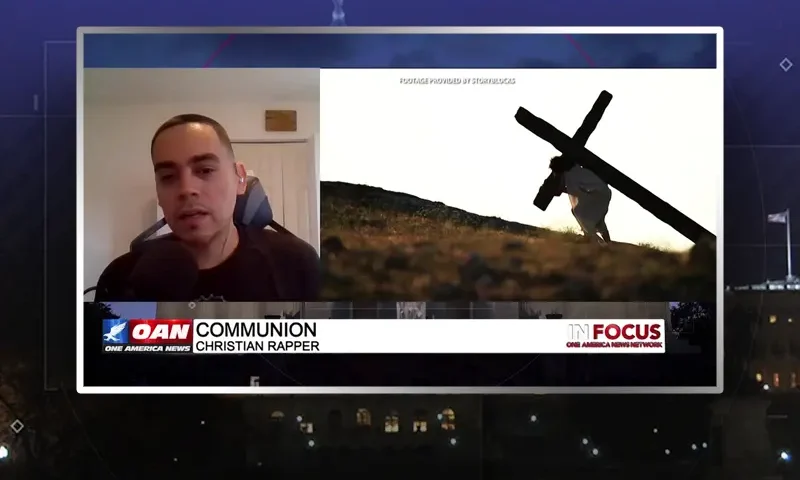 Video still from In Focus on One America News Network during an interview with the guest, Communion.
