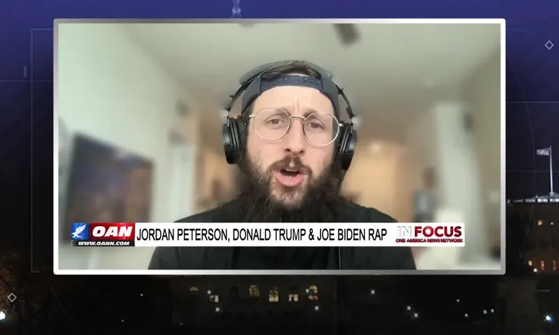 Video still from In Focus on One America News Network during an interview with the guest, Hi-Rez the Rapper.