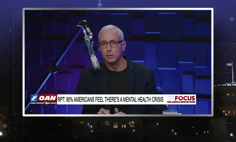 Video still from In Focus on One America News Network during an interview with the guest, Dr. Drew.