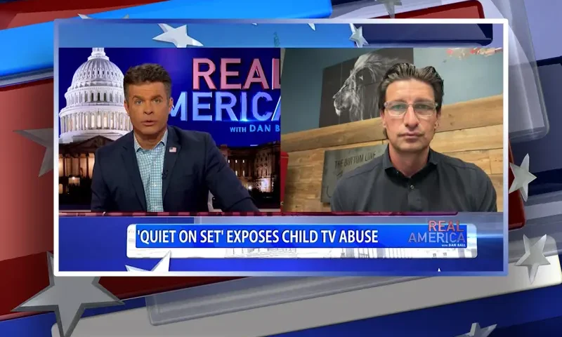 Video still from Real America on One America News Network showing a split screen of the host on the left side, and on the right side is the guest, Jaco Booyens.