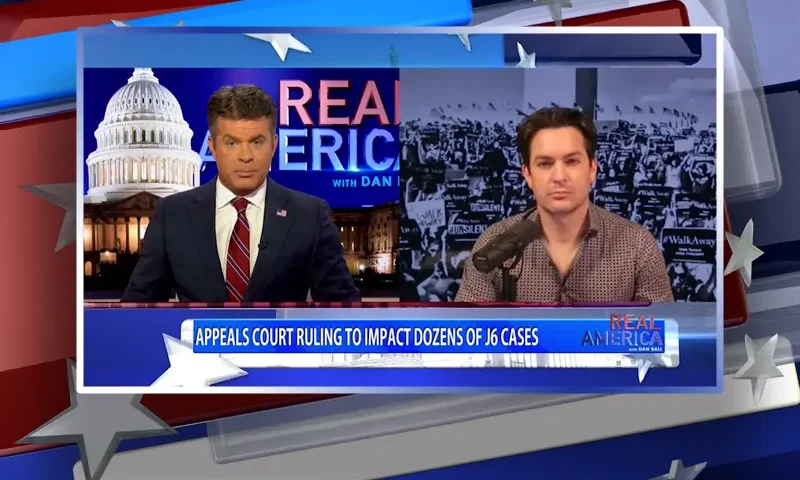 Video still from Real America on One America News Network showing a split screen of the host on the left side, and on the right side is the guest, Brandon Straka.