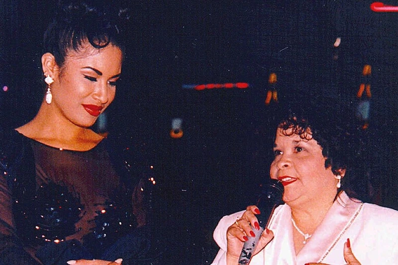 Selena (left) and Saldivar (right) at a 1994 Tejano Music Awards party. (Photo Via Associated Press)