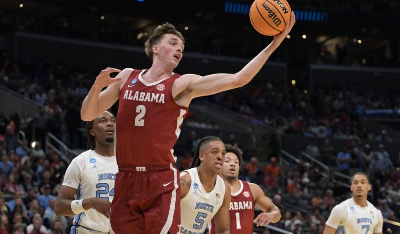 Alabama Crimson Tide forward Grant Nelson (2) grabs a rebound in the first half against the North Carolina Tar Heels in the semifinals of the West Regional of the 2024 NCAA Tournament at Crypto.com Arena. Mandatory Credit: Jayne Kamin-Oncea-USA TODAY Sports