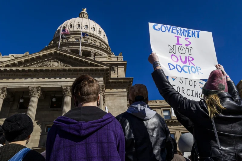 People in front of the Idaho Statehouse in 2023, in Boise, Idaho. (Darin Oswald / AP file)