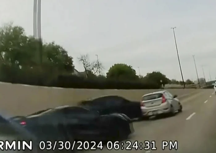 In this screen grab taken from dash camera video provided by Bill Nabors, two speeding sports cars, left and second from left, cause a chain-reaction crash on the North Central Expressway, in Dallas, Saturday, March 30, 2024. Dallas police said Wednesday, April 10, that Kansas City Chiefs' wide receiver Rashee Rice faces charges including aggravated assault after he and another speeding driver of a sports car caused a chain-reaction crash on a Dallas highway. (Bill Nabors via AP)