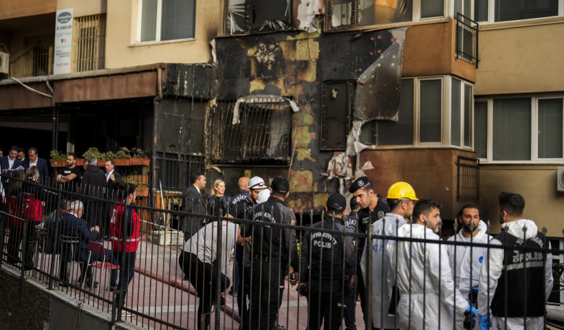 Emergency teams and police officers work in the aftermath of a fire that broke out during day time in a nightclub in Istanbul, Turkey, Tuesday, April 2, 2024. A fire at an Istanbul nightclub during renovations on Tuesday killed at least 29 people, officials and reports said. Several people, including managers of the club, were detained for questioning. (AP Photo/Khalil Hamra)