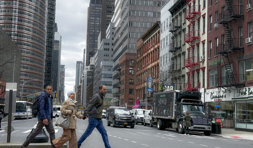 CORRECTS DAY TO FRIDAY - Pedestrians cross the street in New York on Friday, April 5, 2024. An earthquake shook the densely populated New York City metropolitan area Friday morning, the U.S. Geological Survey said, with residents across the Northeast reporting rumbling in a region where people are unaccustomed to feeling the ground move. (AP Photo/John Minchillo)