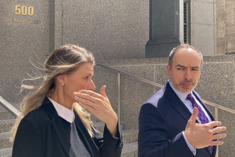 Aimee Harris, left, walks out of Manhattan federal court, Tuesday, April 9, 2024, in New York. The Florida mother has been sentenced to a month in prison and three months of home confinement for stealing and selling President Joe Biden's daughter's diary four years ago. (AP Photo/Larry Neumeister)