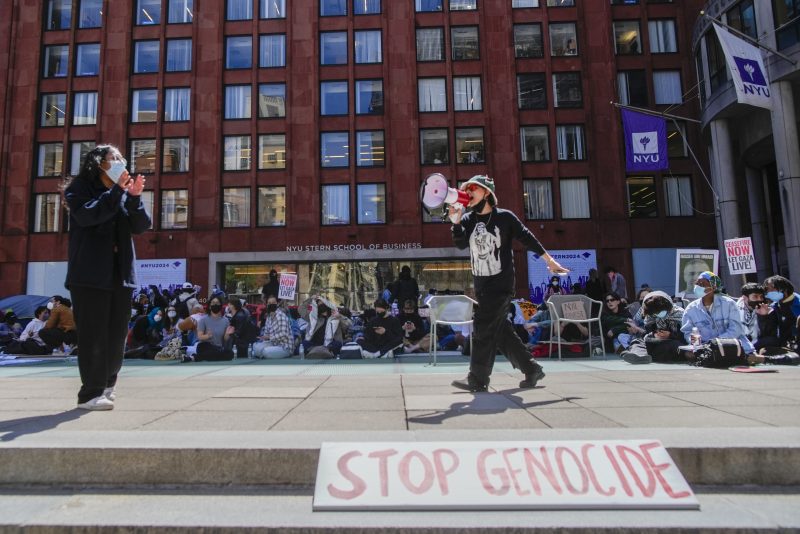 New York University students and pro-Palestinian supporters rally outside the NYU Stern School of Business building, Monday, April 22, 2024, in New York. (AP Photo/Mary Altaffer)
