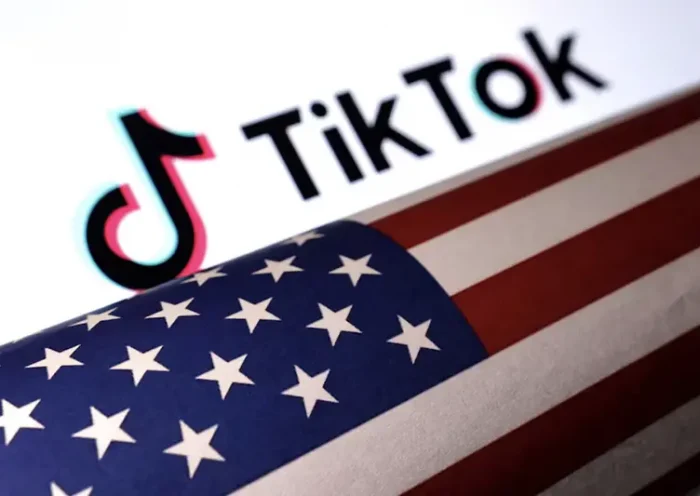 U.S. flag is placed on a TikTok logo in this illustration taken March 20, 2024. REUTERS/Dado Ruvic/Illustration