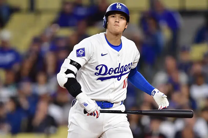 Los Angeles Dodgers designated hitter Shohei Ohtani (17) reacts after striking out against the San Francisco Giants during the first inning at Dodger Stadium. Mandatory Credit: Gary A. Vasquez-USA TODAY Sports