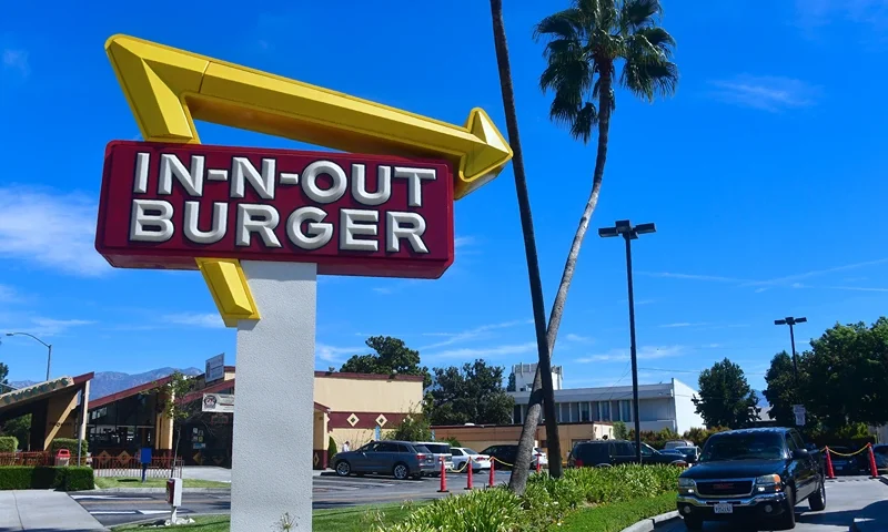 US-POLITICS-CAMPAIGN-MONEY A driver pulls into the drive-thru lane at an In-N-Out Burger restaurant in Alhambra, California on August 30, 2018. - Califoria's Democratic Party Chairman, Eric Bauman, is calling for a boycott of the Irvine, CA based fast food chain after it donated $25,000 to help California Republicans in November. In addition to this week's donation, In-N-Out donated $30,000 to the GOP in 2017 and 2016. (Photo by Frederic J. BROWN / AFP) (Photo by FREDERIC J. BROWN/AFP via Getty Images)