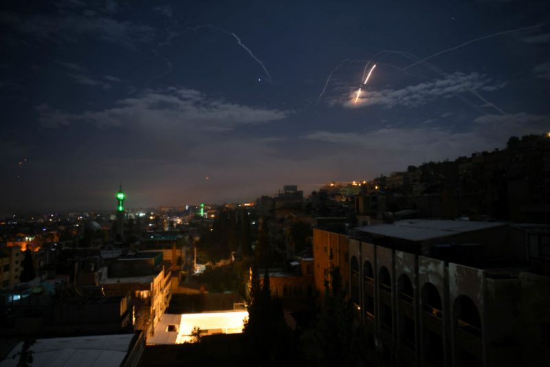 A picture taken early on January 21, 2019 shows Syrian air defence batteries responding to what the Syrian state media said were Israeli missiles targeting Damascus. - Israel struck what it said were Iranian targets in Syria today in response to rocket fire it blamed on Iran, sparking concerns of an escalation after a monitor reported 11 fighters killed. Israel openly claimed responsibility for the strikes against facilities it said belonged to the Iranian Revolutionary Guards' Quds Force, continuing its recent practice of speaking more openly about such raids. (Photo by STR / AFP) (Photo credit should read STR/AFP via Getty Images)