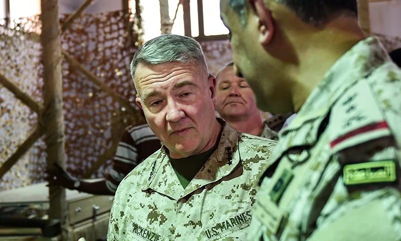 US Marine Corps General Kenneth F. McKenzie Jr. (C, behind), commander of the US Central Command (CENTCOM) and Lieutenant General Fahd bin Turki bin Abdulaziz al-Saud (front), commander of the Saudi-led coalition forces in Yemen, are shown reportedly Iranian weapons seized by Saudi forces from Yemen's Huthi rebels, during his visit to a military base in al-Kharj in central Saudi Arabia on July 18, 2019. - McKenzie pledged on July 18 to work "aggressively" to ensure maritime safety in strategic Gulf waters after a spate of attacks blamed on Iran. McKenzie's visit to Saudi Arabia comes a day after the US House voted to block $8.1 billion in arms sales to the kingdom and other allies, in a move likely to be vetoed by President Donald Trump. (Photo by Fayez Nureldine / AFP) (Photo credit should read FAYEZ NURELDINE/AFP via Getty Images)