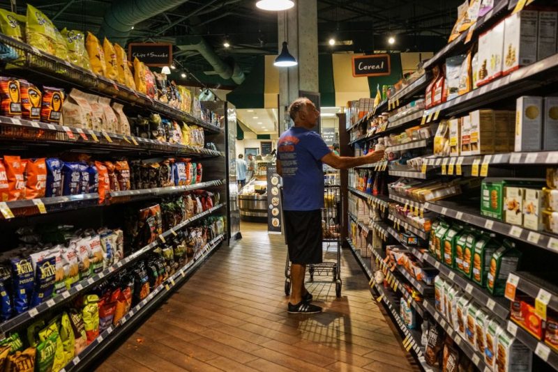 An elderly man shops at a supermarket during reserved shopping hours for elderly people in Miami Beach, on March 21, 2020. - Miami Beach Mayor, Dan Gelber, warned of 