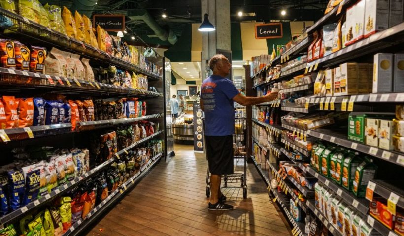 An elderly man shops at a supermarket during reserved shopping hours for elderly people in Miami Beach, on March 21, 2020. - Miami Beach Mayor, Dan Gelber, warned of "devastating consequences" over the virus and ordered bars and gyms to close this week, telling springbreakers: "You've got to think about the person next to you and even the person you don't know." (Photo by CHANDAN KHANNA / AFP) (Photo by CHANDAN KHANNA/AFP via Getty Images)