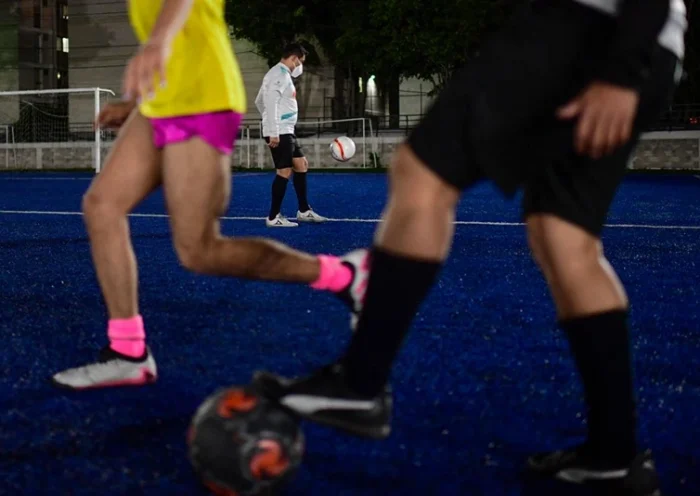 Players of the Kraken football team train at the Benito Juarez sports centre, in Mexico City, on January 27, 2022. - After the Mexican football Association announced the fans shouting homophobic slogans would be expelled from the matches, a an inclusion team for lesbian, gay, bisexual, transgender, transsexual, transvestite and, intersex (LGBTTTI+) players narrates its experience in an ambit marked by homophobia. (Photo by Pedro PARDO / AFP) (Photo by PEDRO PARDO/AFP via Getty Images)