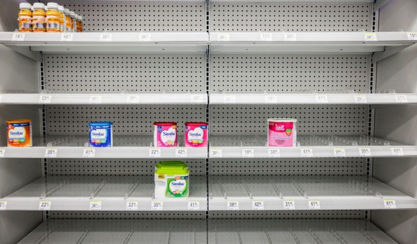 Shelves normally meant for baby formula sit nearly empty at a store in downtown Washington, DC, on May 22, 2022. - A US military plane bringing several tons of much-needed baby formula from Germany landed on May 22, 2022, at an airport in Indiana as authorities scramble to address a critical shortage. (Photo by Samuel Corum / AFP) (Photo by SAMUEL CORUM/AFP via Getty Images)