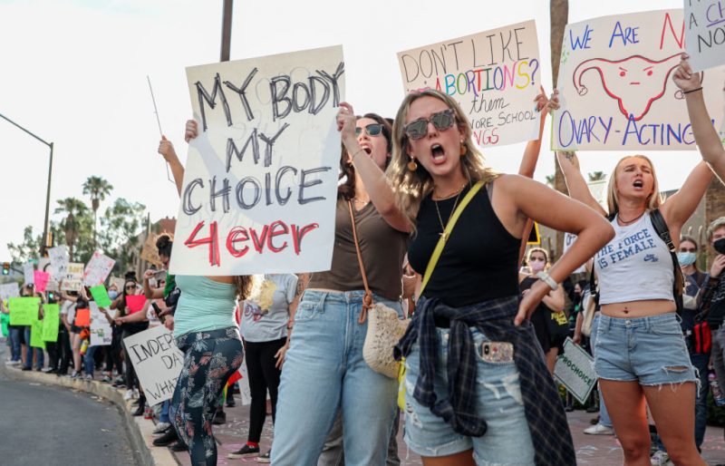 Abortion rights protesters chant during a Pro Choice rally at the Tucson Federal Courthouse in Tucson, Arizona on Monday, July 4, 2022. (Photo by SANDY HUFFAKER / AFP) (Photo by SANDY HUFFAKER/AFP via Getty Images)