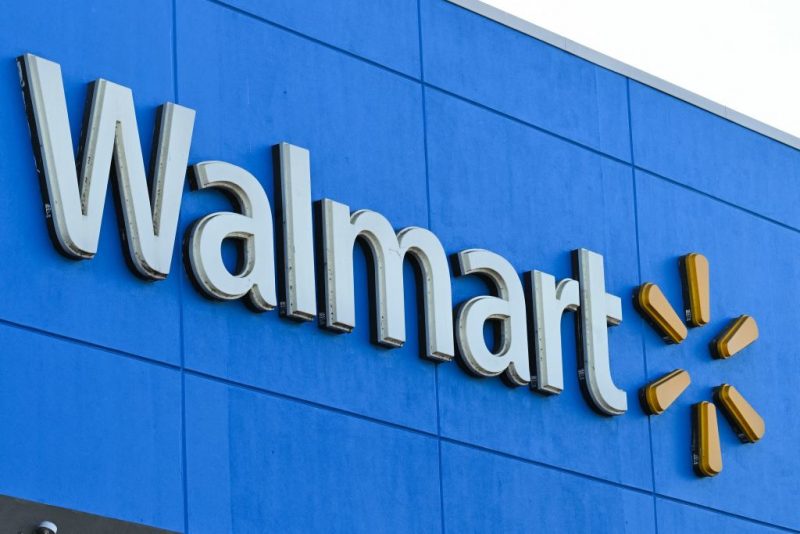 The Walmart logo is seen outside a Walmart store in Burbank, California on August 15, 2022. - Walmart, the largest retailer the United States, will report second quarter earnings on August 16, 2022. (Photo by Robyn Beck / AFP) (Photo by ROBYN BECK/AFP via Getty Images)