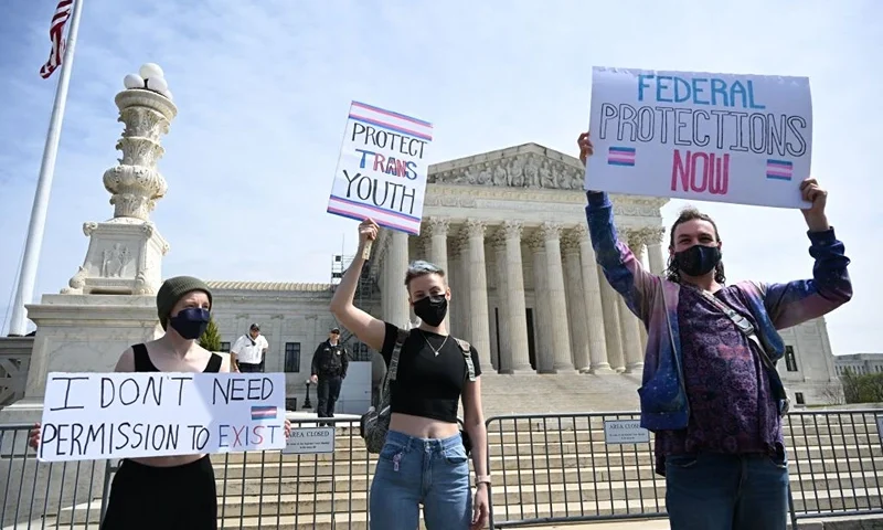 Activists for transgender rights gather in front of the US Supreme Court in Washington, DC, on April 1, 2023. (Photo by ANDREW CABALLERO-REYNOLDS / AFP) (Photo by ANDREW CABALLERO-REYNOLDS/AFP via Getty Images)