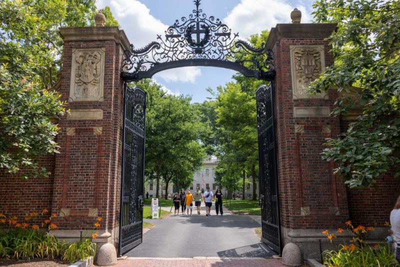 CAMBRIDGE, MASSACHUSETTS - JUNE 29: People walk through the gate on Harvard Yard at the Harvard University campus on June 29, 2023 in Cambridge, Massachusetts. The U.S. Supreme Court ruled that race-conscious admission policies used by Harvard and the University of North Carolina violate the Constitution, bringing an end to affirmative action in higher education. (Photo by Scott Eisen/Getty Images)