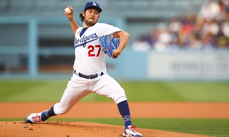 LOS ANGELES, CALIFORNIA - JUNE 28: Trevor Bauer #27 of the Los Angeles Dodgers throws the first pitch in the first inning against the San Francisco Giants at Dodger Stadium on June 28, 2021 in Los Angeles, California. (Photo by Meg Oliphant/Getty Images)