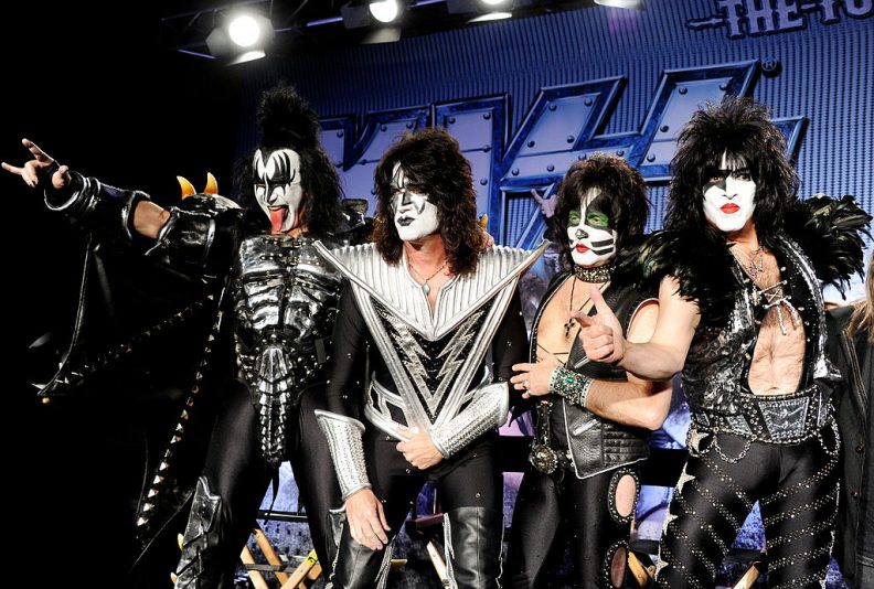 LOS ANGELES, CA - MARCH 20: (L-R) Musicians Gene Simmons, Tommy Thayer, Eric Singer and Paul Stanley appear onstage to announce their upcoming Motley Crue and KISS co-headlining tour at the Hollywood Roosevelt Hotel on March 20, 2012 in Los Angeles, California. (Photo by Kevin Winter/Getty Images)
