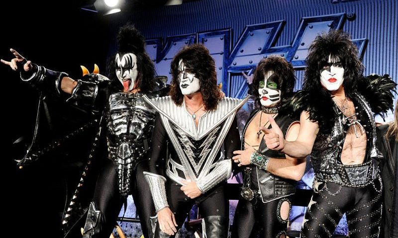 LOS ANGELES, CA - MARCH 20: (L-R) Musicians Gene Simmons, Tommy Thayer, Eric Singer and Paul Stanley appear onstage to announce their upcoming Motley Crue and KISS co-headlining tour at the Hollywood Roosevelt Hotel on March 20, 2012 in Los Angeles, California. (Photo by Kevin Winter/Getty Images)