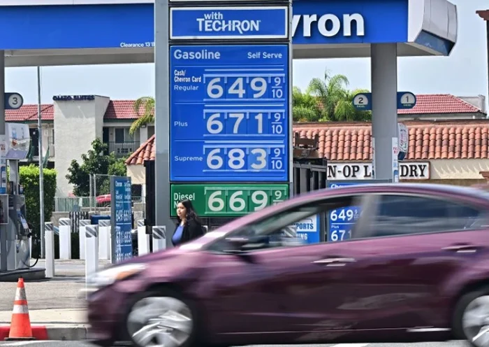 A sign displays the price of gas at more than 6 USD per gallon, at a petrol station in Alhambra, California, on September 18, 2023. Oil prices hit a 10-month high on September 15, 2023, after oil supply cuts in Saudi Arabia and Russia, as well as deadly flooding in Libya, have raised oil prices close to 100 USD per barrel. (Photo by Frederic J. BROWN / AFP) (Photo by FREDERIC J. BROWN/AFP via Getty Images)