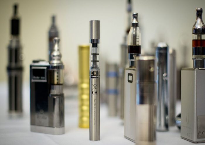 A selection of "Nicotine Containing Products", or "NCP"s are displayed during "The E-Cigarette Summit" at the Royal Academy in central London on November 12, 2013. The merits of e-cigarettes were thrashed out at a one-day gathering of scientists, experts, policymakers and industry figures at the Royal Society in London. The use of electronic cigarettes -- pen-sized battery-powered devices that simulate smoking by heating and vaporising a liquid solution containing nicotine -- has grown rapidly. AFP PHOTO / LEON NEAL / AFP PHOTO / LEON NEAL (Photo credit should read LEON NEAL/AFP via Getty Images)