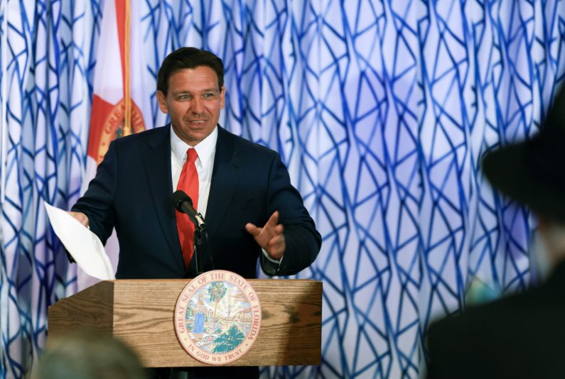 MIAMI BEACH, FLORIDA - MARCH 20: Florida Gov. Ron DeSantis during a news conference held at the Santorini by Georgios restaurant on March 20, 2024 in Miami Beach, Florida. DeSantis talked about preventing unauthorized camping and public sleeping during the event and signed Florida House Bill 1365, which addresses homelessness. (Photo by Joe Raedle/Getty Images)