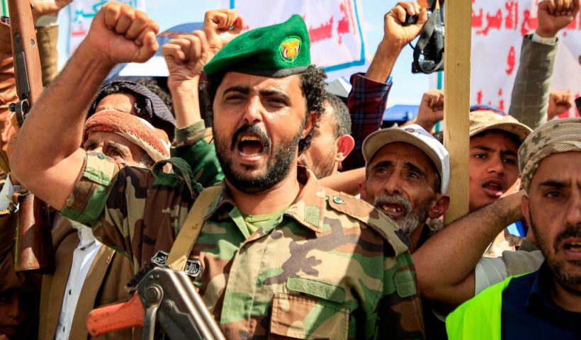 A member of security forces loyal to Yemen's Huthi group chants slogans with others during a pro-Palestinian and anti-Israel rally outside al-Saleh mosque in the Huthi-held capital Sanaa on March 29, 2024 amid the ongoing conflict in the Gaza Strip between Israel and the Palestinian militant group Hamas. (Photo by MOHAMMED HUWAIS / AFP) (Photo by MOHAMMED HUWAIS/AFP via Getty Images)