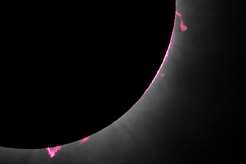 In this NASA handout, prominences from the sun are shown during a total solar eclipse that swept across a narrow portion of the North American April 8, 2024 as seen from Dallas, Texas. The eclipse could be seen from Mexico's Pacific coast to the Atlantic coast of Newfoundland, Canada. A partial solar eclipse was visible across the entire North American continent along with parts of Central America and Europe.  (Photo by Keegan Barber/NASA via Getty Images)